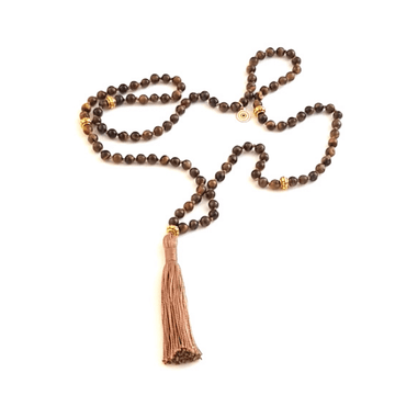 Handmade Tigers Eye Solar Plexus Mala Necklace loosely laid on table